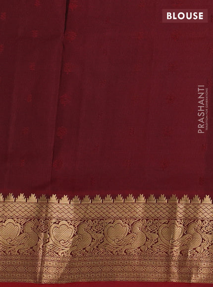 Pure soft silk saree green and maroon with allover zari woven buttas and zari woven border