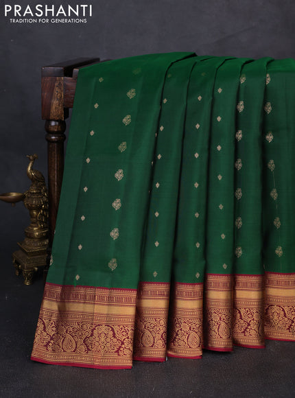 Pure soft silk saree bottle green and wine shade with allover zari woven buttas and zari woven border