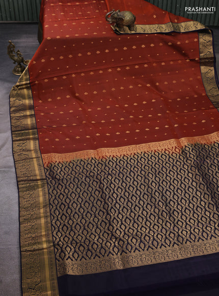Pure soft silk saree rust shade and navy blue with allover zari woven buttas and zari woven border