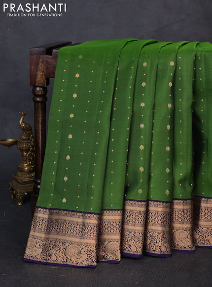 Pure soft silk saree green and navy blue with allover zari woven buttas and zari woven border