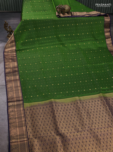 Pure soft silk saree green and navy blue with allover zari woven buttas and zari woven border