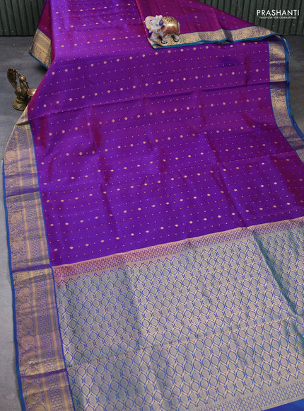 Pure soft silk saree purple and teal green with allover zari woven buttas and zari woven border