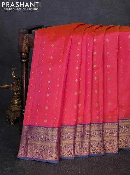 Pure soft silk saree dual shade of pinkish orange and teal green with allover zari woven buttas and zari woven border