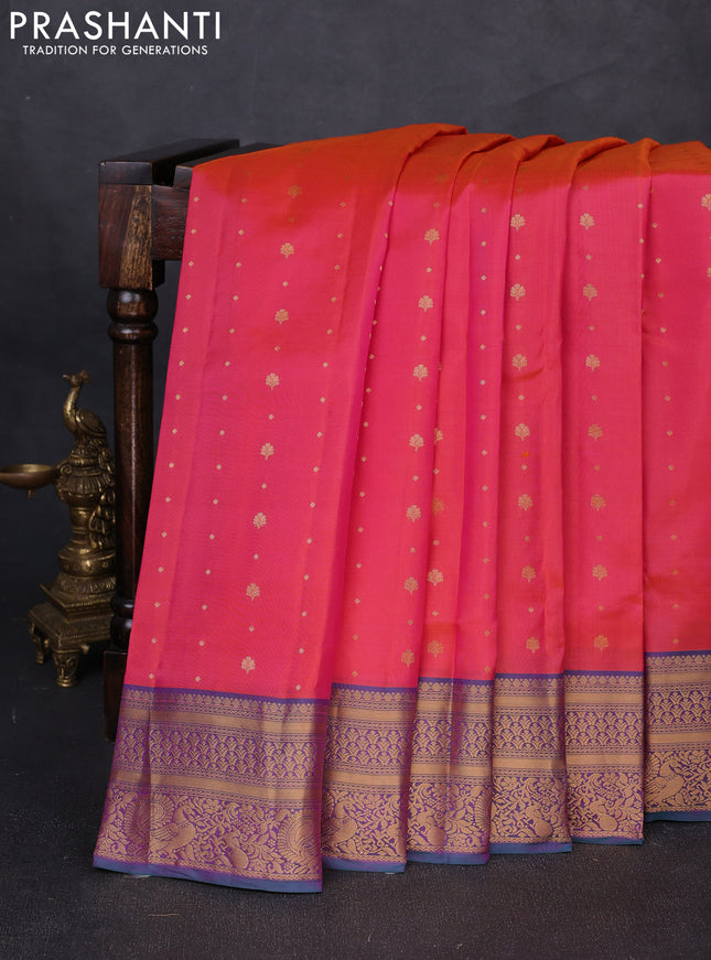 Pure soft silk saree dual shade of pinkish orange and teal green with allover zari woven buttas and zari woven border