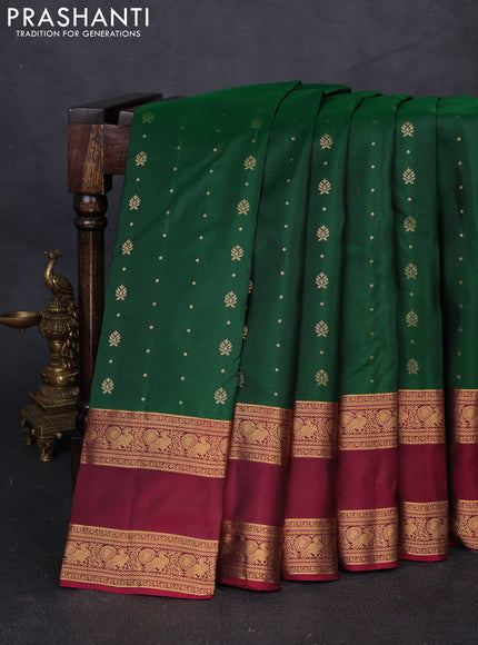 Pure soft silk saree green and magenta pink with allover zari woven buttas and rettapet zari woven border