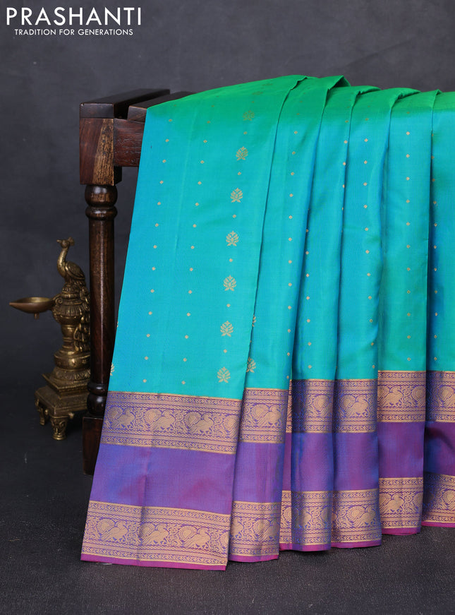 Pure soft silk saree teal green and purple with allover zari woven buttas and rettapet zari woven border