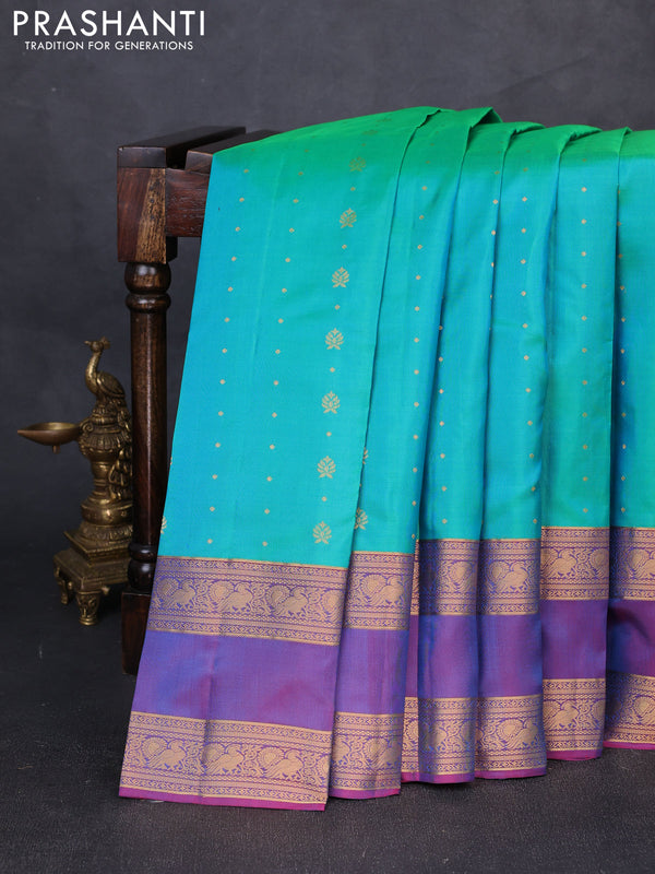 Pure soft silk saree teal green and purple with allover zari woven buttas and rettapet zari woven border