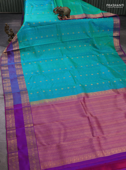 Pure soft silk saree teal green and purple with allover zari woven buttas and rettapet zari woven border