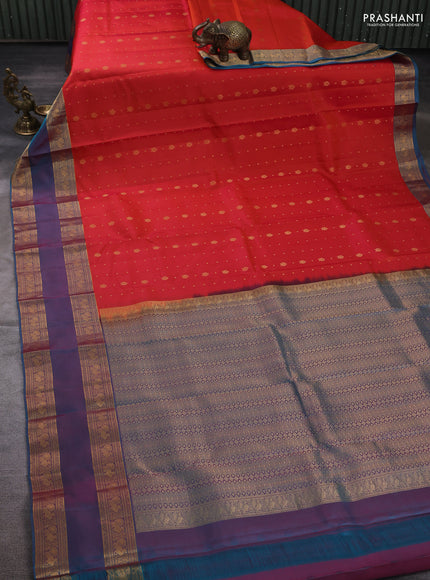 Pure soft silk saree orange and teal blue with allover zari woven buttas and rettapet zari woven border