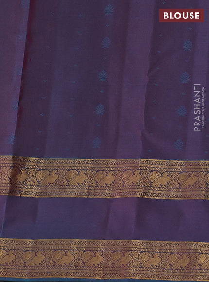 Pure soft silk saree orange and teal blue with allover zari woven buttas and rettapet zari woven border