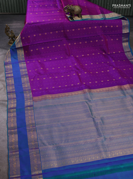 Pure soft silk saree purple and teal blue with allover zari woven buttas and rettapet zari woven border