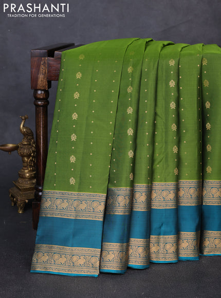 Pure soft silk saree light green and teal blue with allover zari woven buttas and rettapet zari woven border