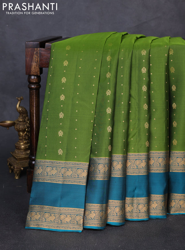 Pure soft silk saree light green and teal blue with allover zari woven buttas and rettapet zari woven border