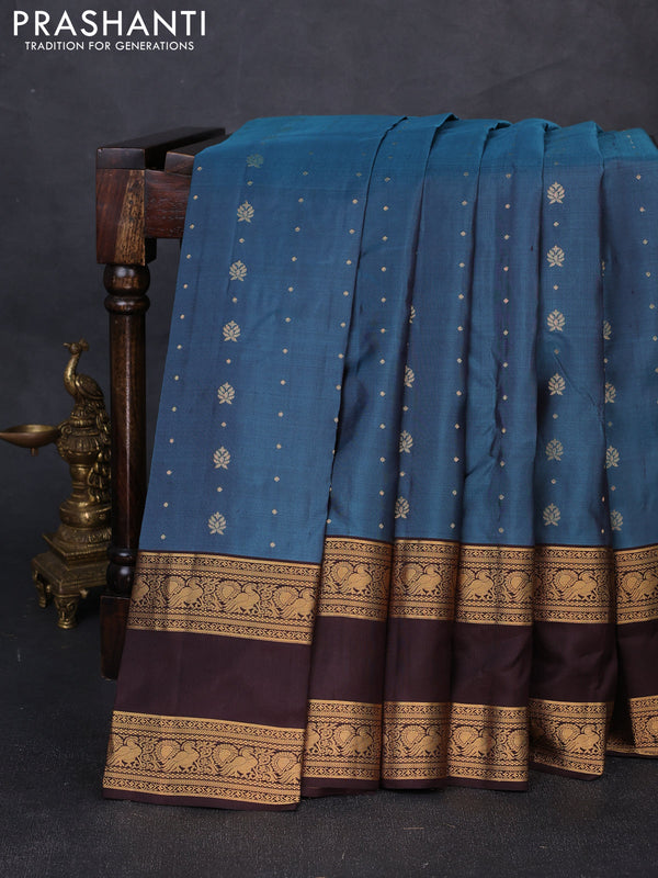 Pure soft silk saree peacock blue shade and coffee brown with allover zari woven buttas and rettapet zari woven border