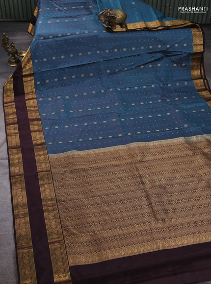 Pure soft silk saree peacock blue shade and coffee brown with allover zari woven buttas and rettapet zari woven border