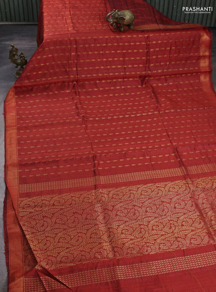 Pure dupion silk saree orange with allover zari woven buttas and zari woven border