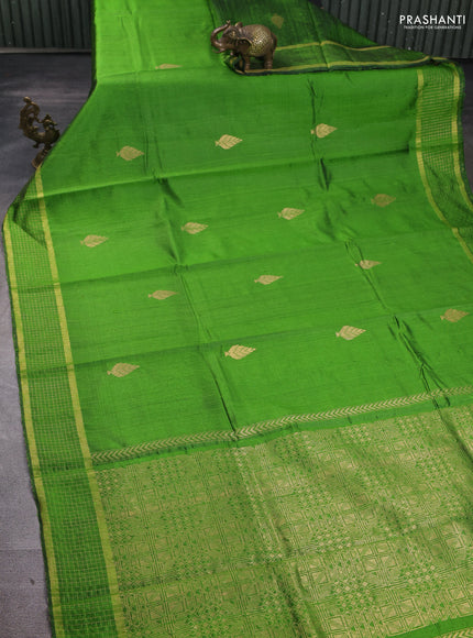 Pure dupion silk saree light green with zari woven buttas and zari woven checked border