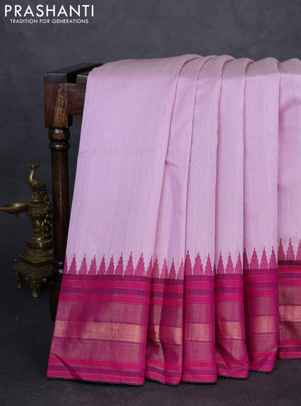 Pure dupion silk saree mild lavender and pink with plain body and temple design zari woven border