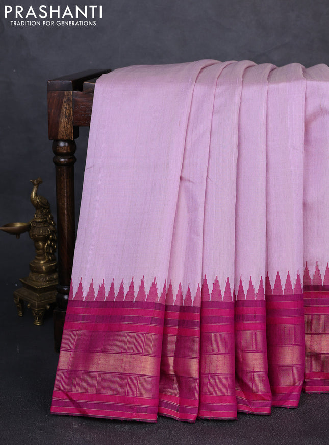 Pure dupion silk saree mild lavender and pink with plain body and temple design zari woven border