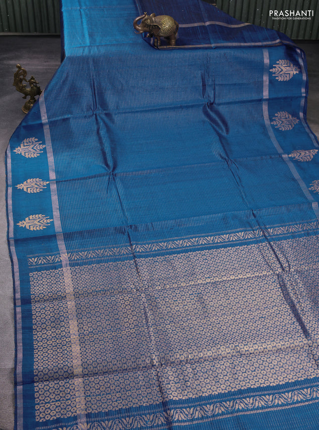 Pure dupion silk saree cs blue with allover zari stripe pattern and rettapet zari woven butta border
