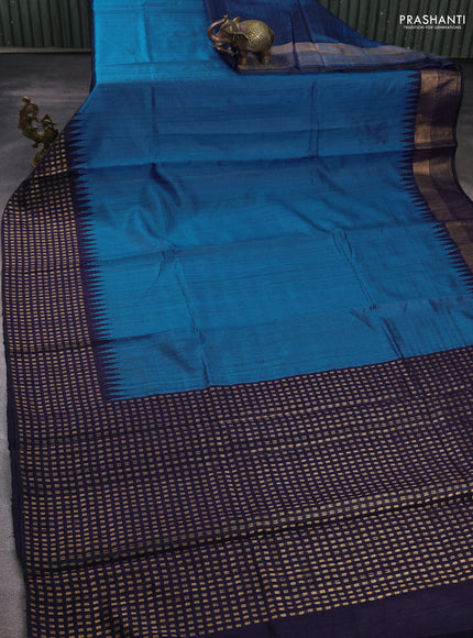 Pure dupion silk saree cs blue and black with plain body and temple design zari woven border