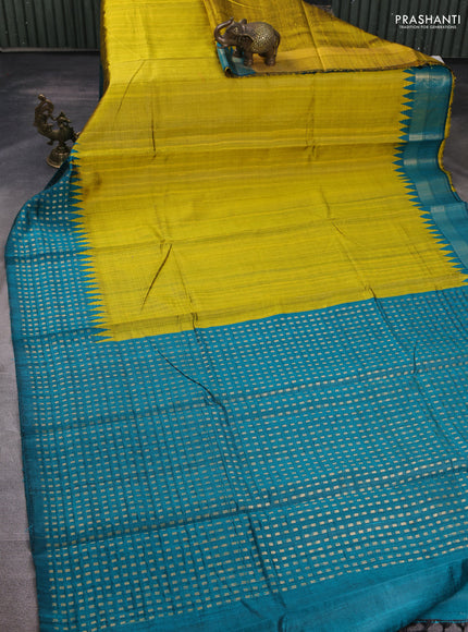 Pure dupion silk saree mustard yellow and teal green with plain body and temple design zari woven border