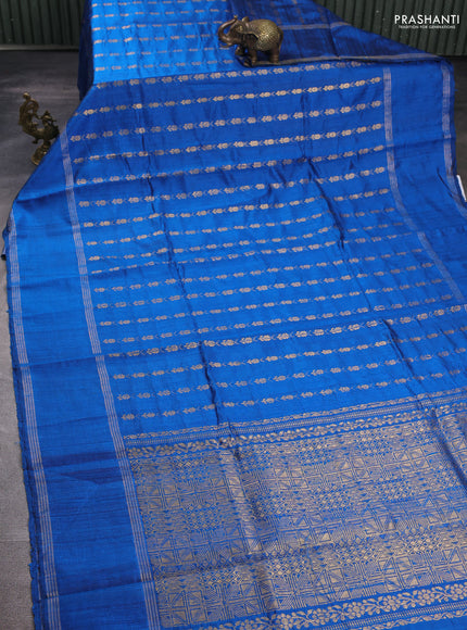 Pure dupion silk saree cs blue with allover zari woven floral butta weaves and rettapet zari woven border