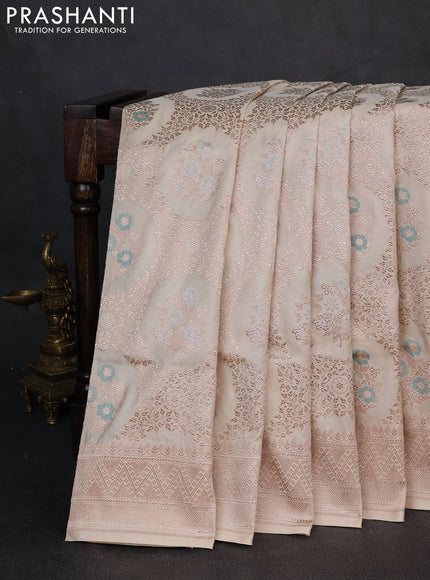 Banarasi uppada silk saree beige with allover thread & zari weaves and zari woven border