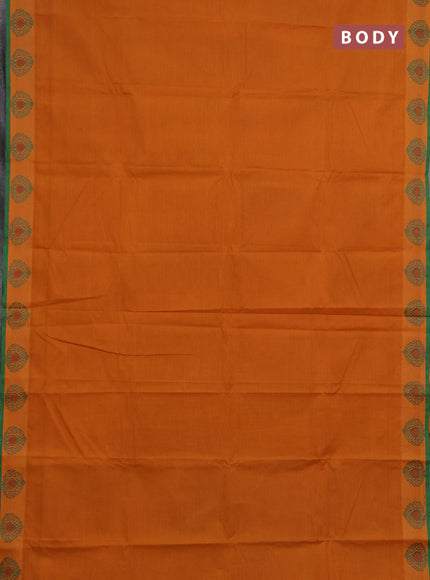Chettinad cotton saree dark mustard and green with plain body and thread woven border