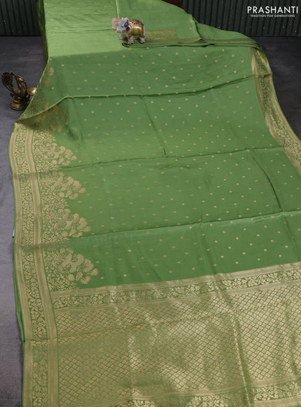 Banarasi silk saree green with allover floral zari woven buttas and long zari woven border