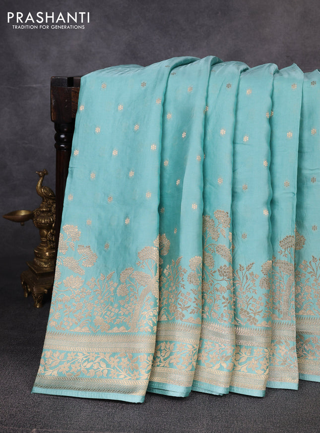 Banarasi silk saree teal green with allover floral zari woven buttas and long zari woven border