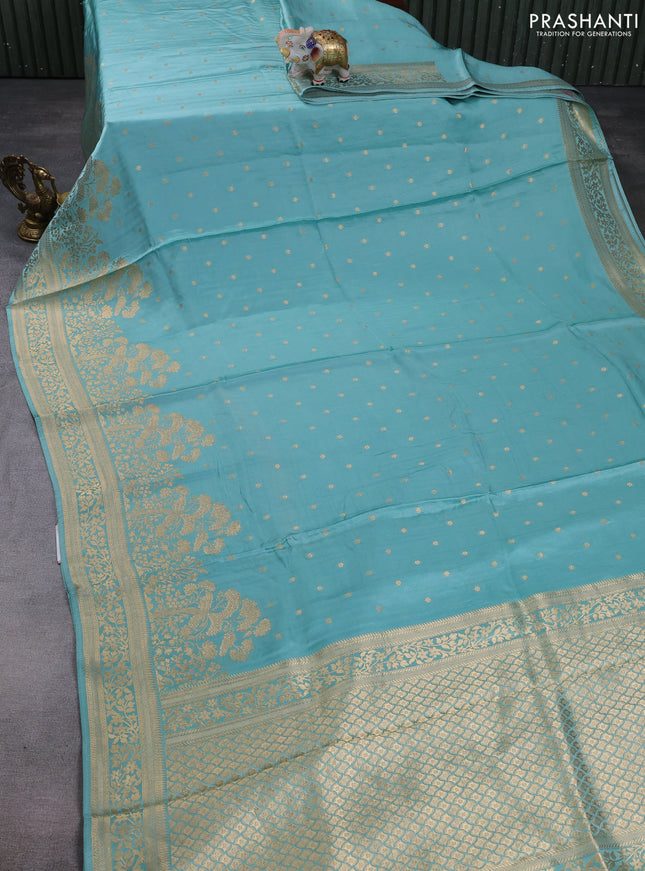 Banarasi silk saree teal green with allover floral zari woven buttas and long zari woven border