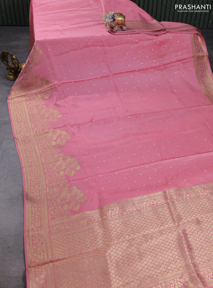 Banarasi silk saree light pink with allover floral zari woven buttas and long zari woven border