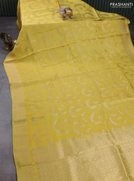 Banarasi silk saree yellow shade with allover zari weaves and zari woven border