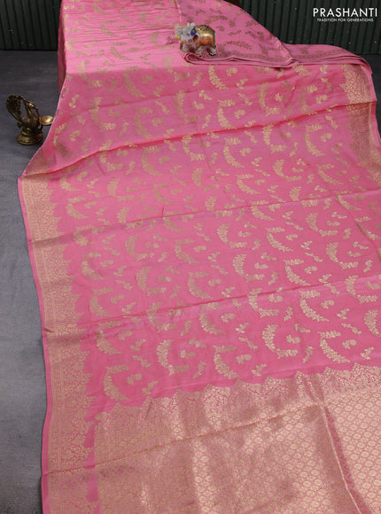 Banarasi silk saree light pink with allover zari weaves and zari woven border