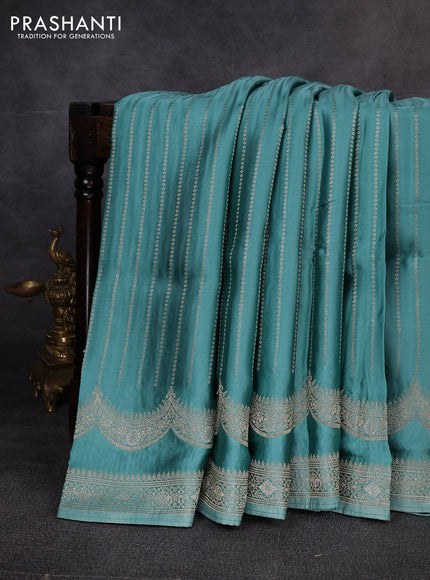 Banarasi silk saree teal green with allover zari stripe pattern and zari woven border