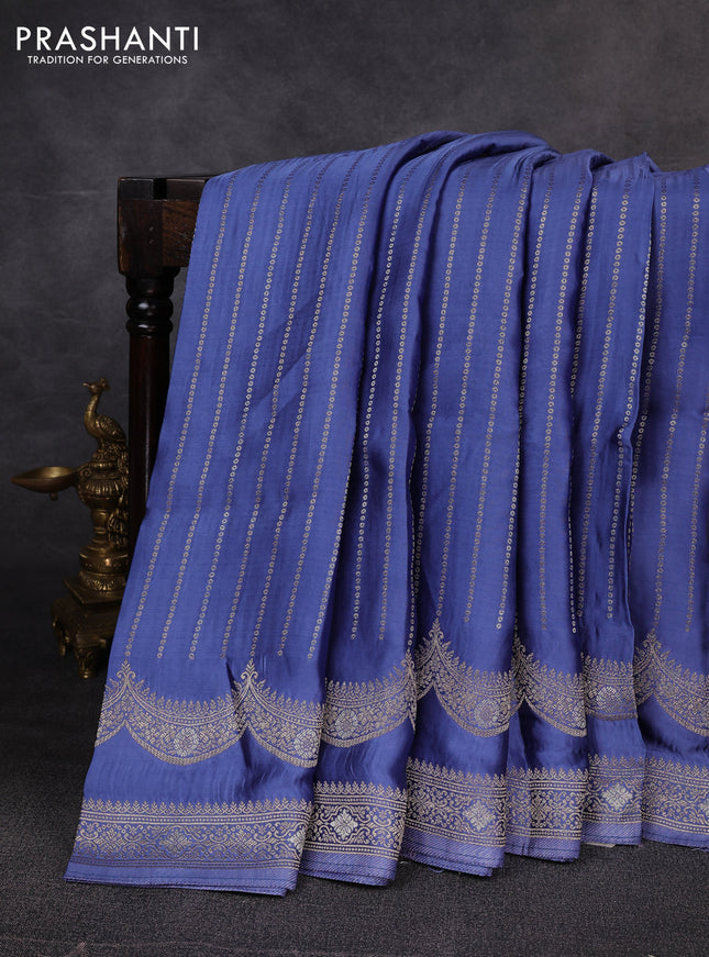 Banarasi silk saree blue shade with allover zari stripe pattern and zari woven border
