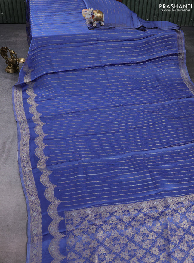 Banarasi silk saree blue shade with allover zari stripe pattern and zari woven border
