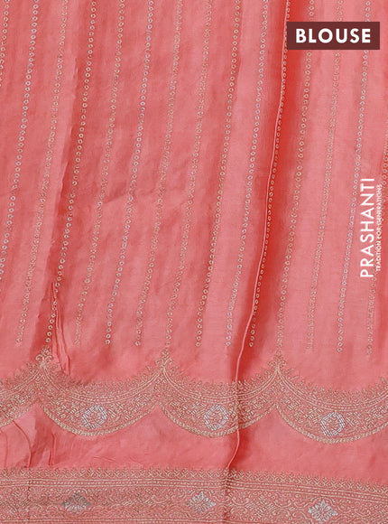 Banarasi silk saree peach orange with allover zari stripe pattern and zari woven border