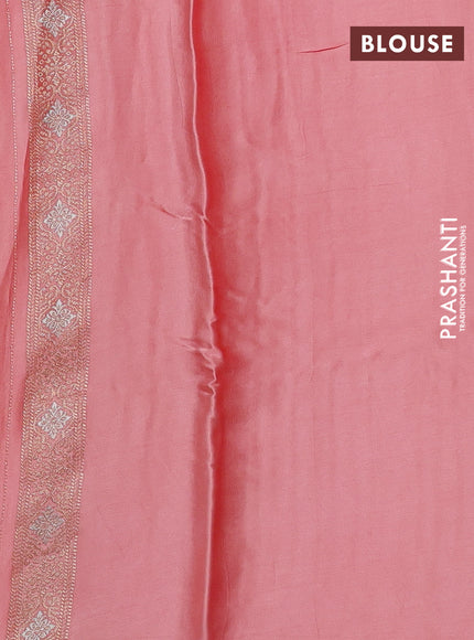 Banarasi silk saree peach shade with allover zari stripe pattern and zari woven border