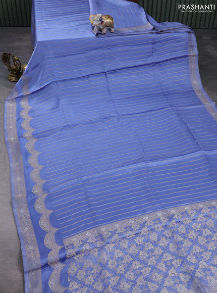 Banarasi silk saree pastel blue with allover zari stripe pattern and zari woven border