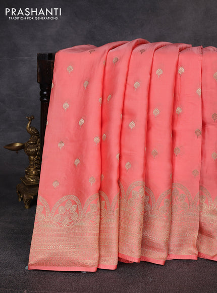 Banarasi silk saree peach shade with allover zari woven buttas and zari woven border