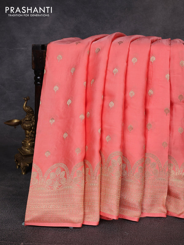 Banarasi silk saree peach shade with allover zari woven buttas and zari woven border