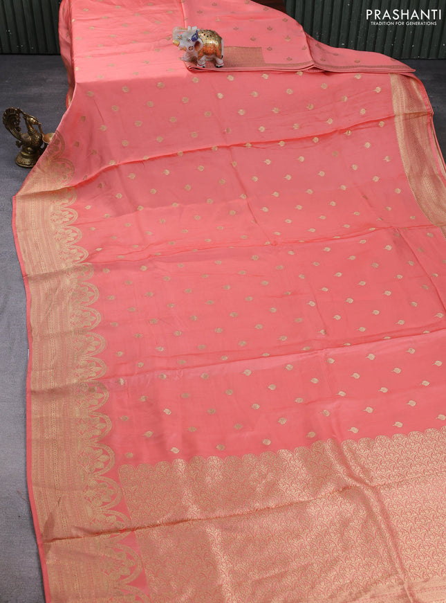 Banarasi silk saree peach shade with allover zari woven buttas and zari woven border