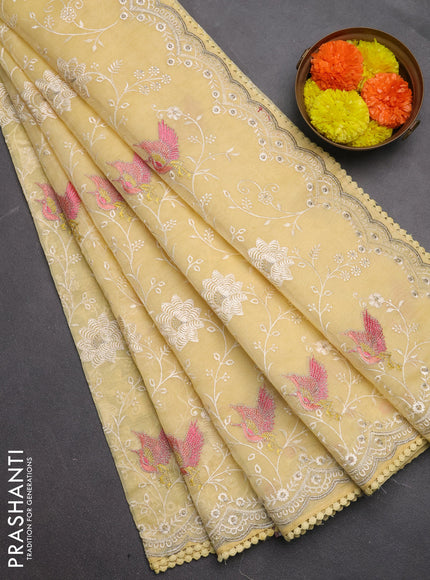 Semi Chanderi Saree pale yellow with allover embroidery weaves and corsha lace work border