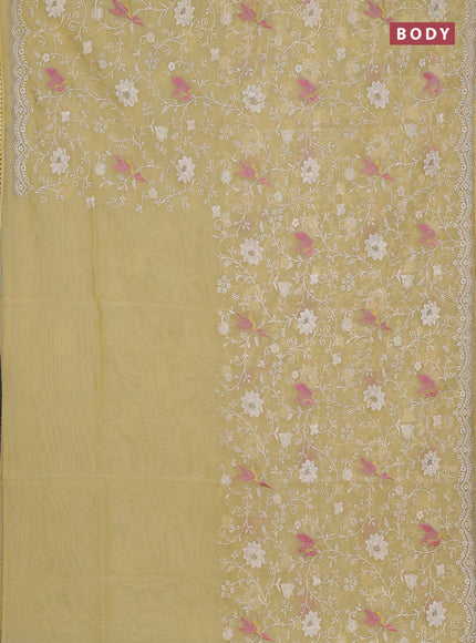 Semi Chanderi Saree pale yellow with allover embroidery weaves and corsha lace work border