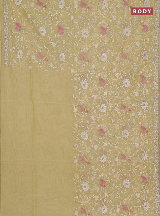 Semi Chanderi Saree pale yellow with allover embroidery weaves and corsha lace work border