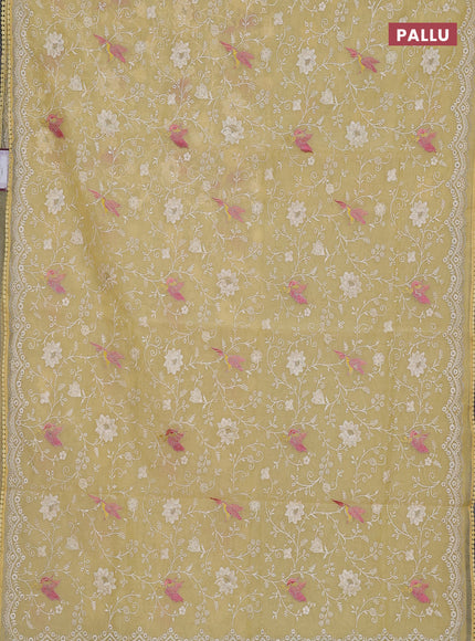 Semi Chanderi Saree pale yellow with allover embroidery weaves and corsha lace work border