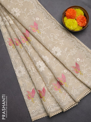 Semi Chanderi Saree beige with allover embroidery weaves and corcia lace work border