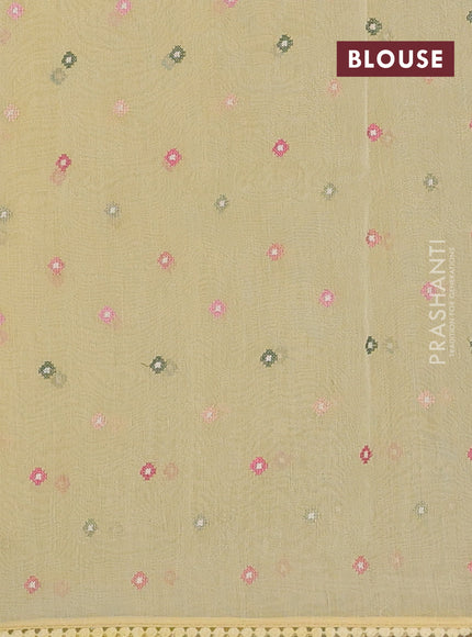 Semi Chanderi Saree pale yellow with allover convent embroidery buttas and corsha lace work border